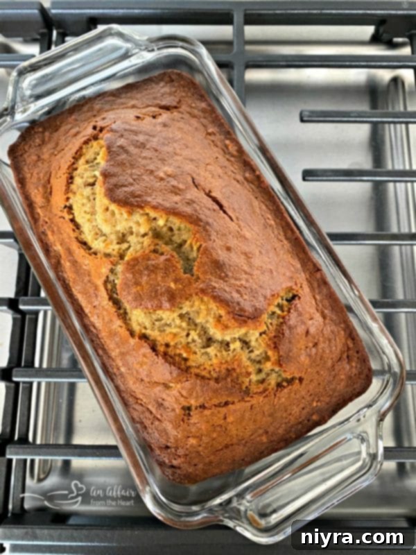 Unforgettable Banana Bread 5 A Golden Loaf of Banana Bread Cooling on a Wire Rack