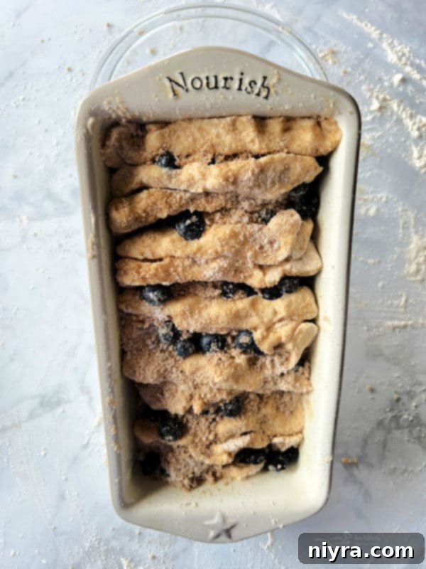 Baked Blueberry Lemon Pull-Apart Bread being removed from the oven, golden brown