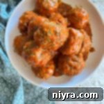 bowl of porcupine meatball with tomato sauce