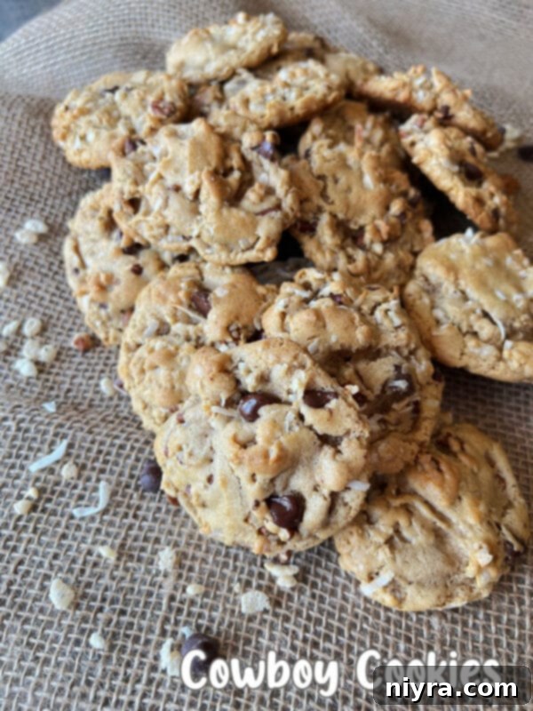 A Pinterest-optimized image for Cowboy Cookies, encouraging sharing and saving.