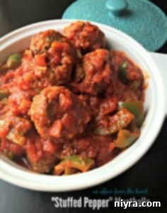 Savory Stuffed Pepper Meatballs in a rich tomato sauce, ready to serve