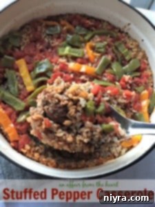 Hearty Stuffed Pepper Casserole baked in a dish, with melted cheese
