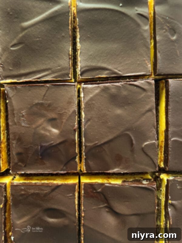 Scoring the chocolate topping of Nanaimo Bars