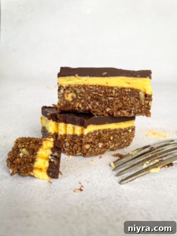 Close-up of Nanaimo Bars showing the three distinct layers