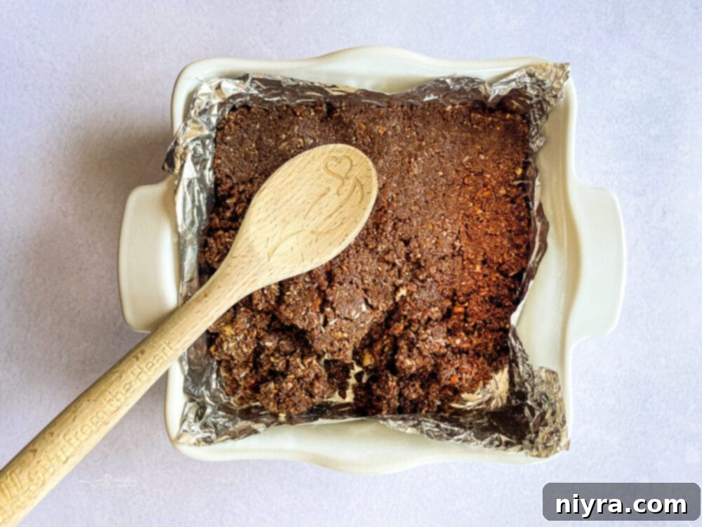 Mixing the ingredients for the Nanaimo Bar base layer