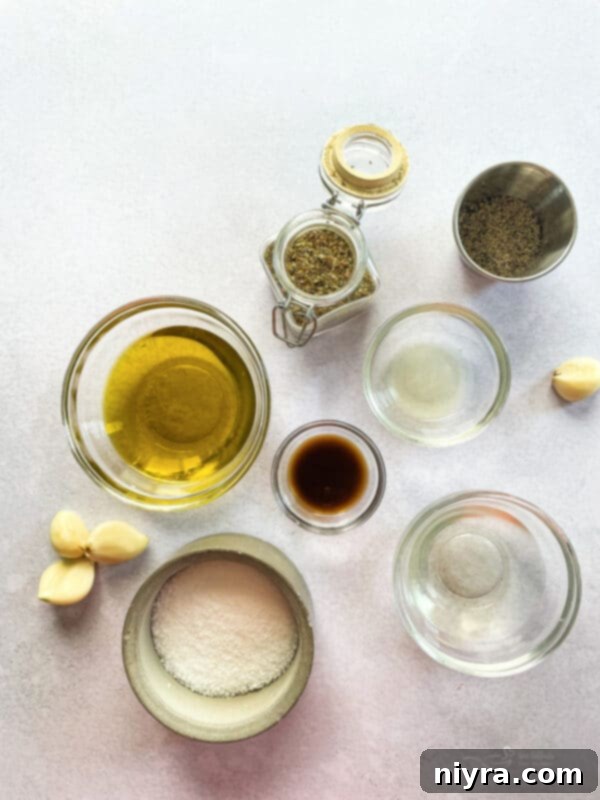 Ingredients for the 1905 Salad dressing: olive oil, vinegar, lemon, garlic, and Worcestershire sauce.