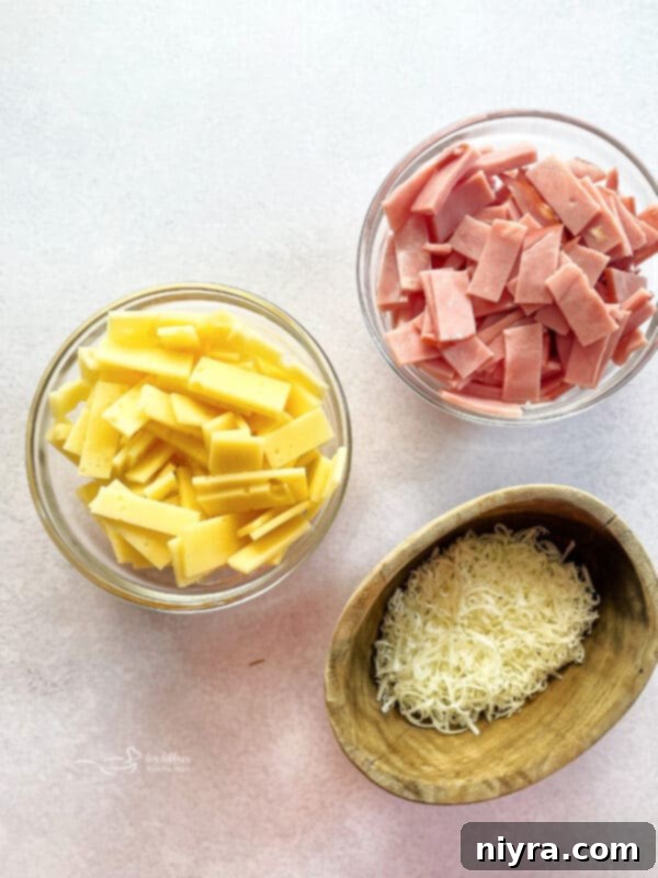 Hands preparing the salad ingredients in a bowl.