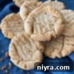 Mom's peanut butter cookie recipe on blue linen