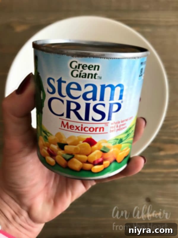 Champion's Irresistible Dip 8 Preparing the Award-Winning Crack Dip ingredients in a bowl.