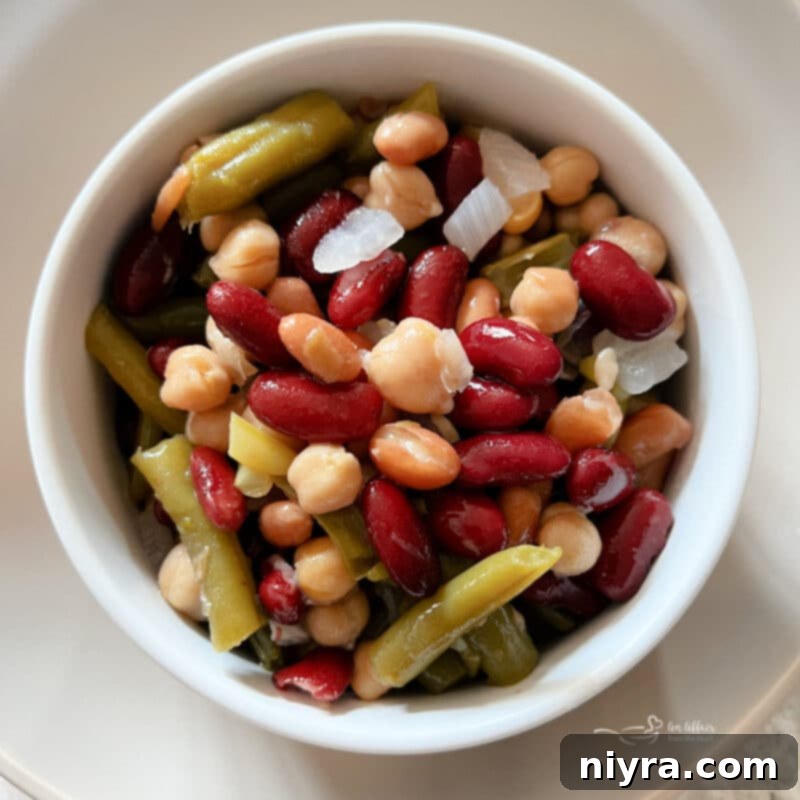Crispy Air Fryer BBQ Tenders 15 Paisley Farm Foods Five Bean Salad in a large bowl