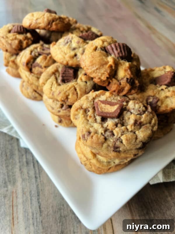 Mixing butter, sugars, and eggs in a stand mixer.