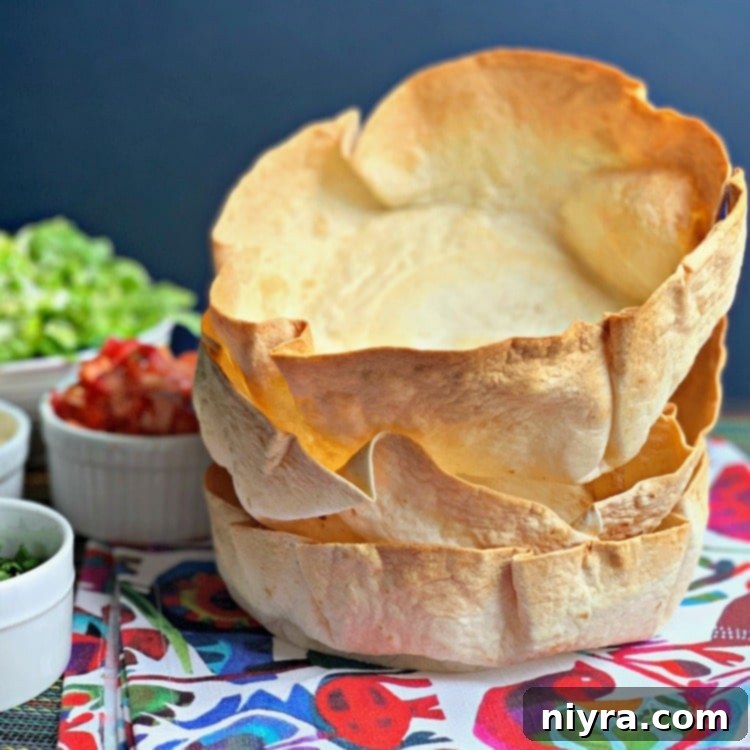 Air Fryer Taco Salad Bowls stacked close up