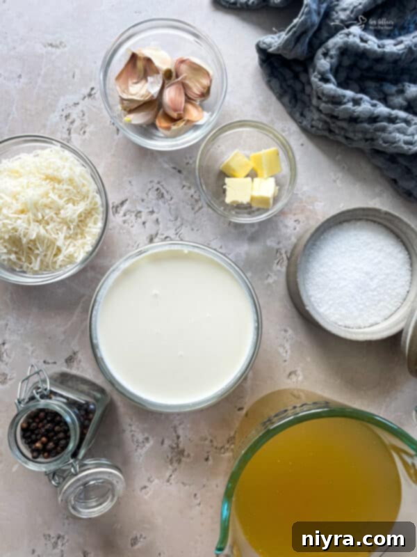 Fettuccine noodles, butter, garlic, and heavy cream, key ingredients for Instant Pot Alfredo.
