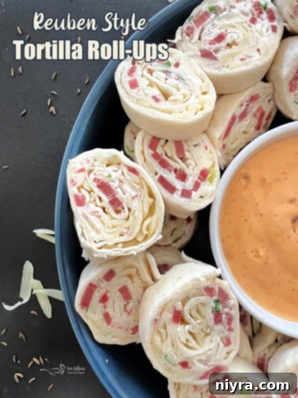 A vibrant platter of Reuben Style Tortilla Roll-Ups, perfect for any gathering.