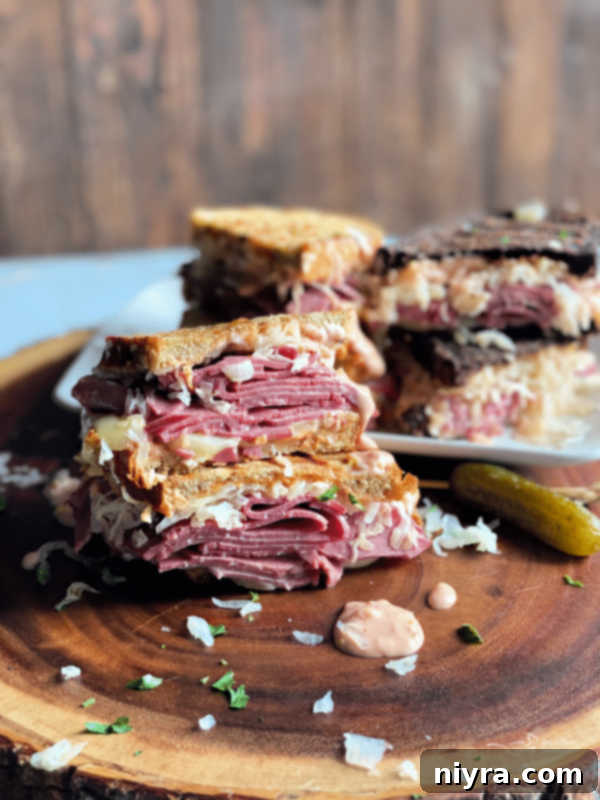 A classic Reuben sandwich with corned beef, Swiss cheese, sauerkraut, and Thousand Island dressing.
