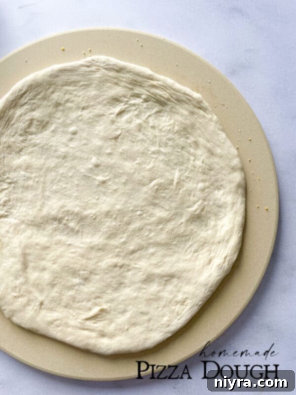 A perfectly baked homemade pizza with a golden, crispy crust and melted cheese.