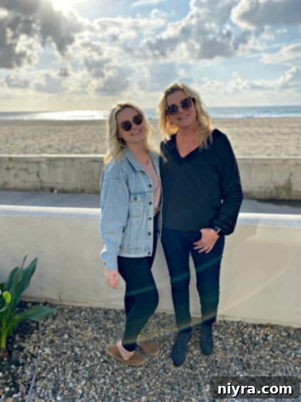 Mother and daughter, Michaela and Josie, smiling together.