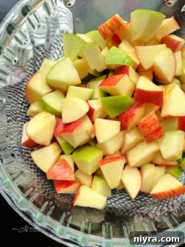 Image demonstrating the first step: diced apples.