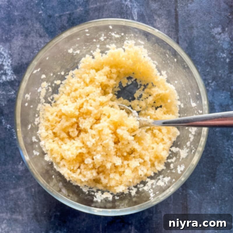 Cauliflower and carrot mixture poured into a baking dish.