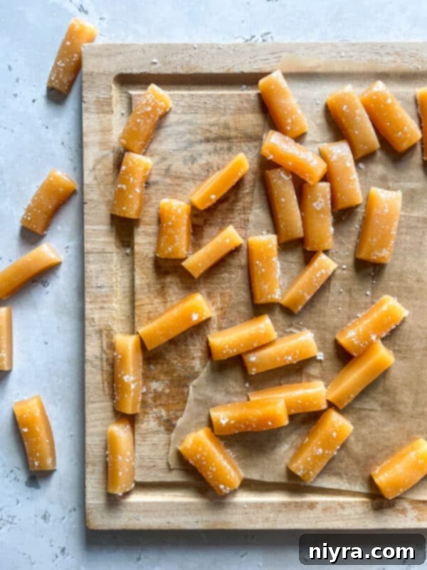 Caramel mixture simmering in a heavy pan.