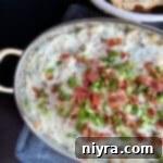 Savory Sauerkraut, Bacon and Swiss Dip 17 Sauerkraut, Bacon & Swiss Dip in a baking dish.