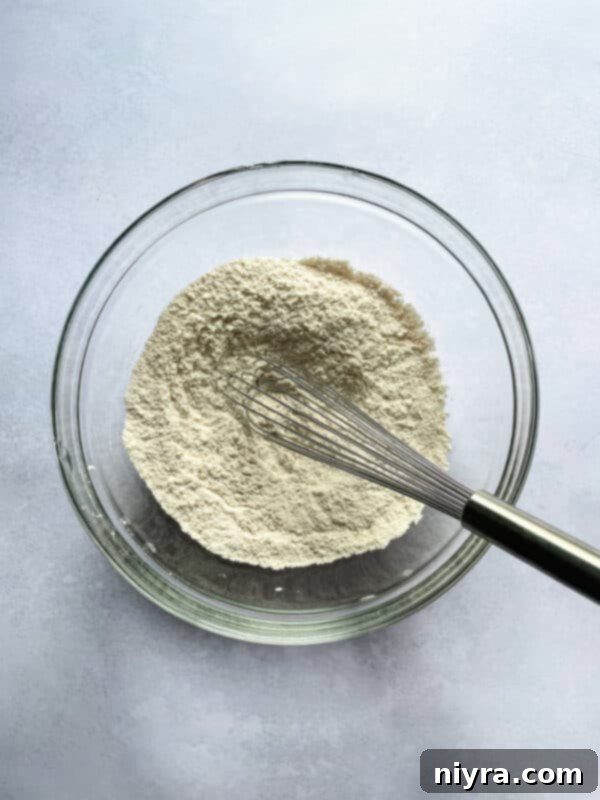 Warm Banana Bliss Bites 6 Oven preheating with a baking sheet ready.