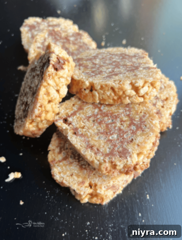 Close-up of three Scotcheroo Pinwheels stacked beautifully.