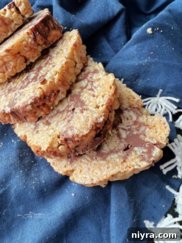Close-up of a stack of Scotcheroo Pinwheels, showing their layers.