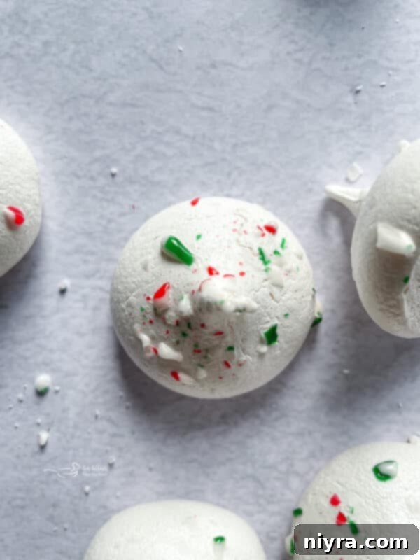 Minty Dream Clouds 9 A stack of perfectly cooled peppermint meringues on a wire rack, ready for storage or serving.