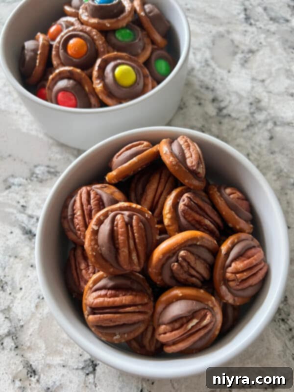 Overhead shot of Rolo Pretzels cooling on a baking sheet, ready to be enjoyed.