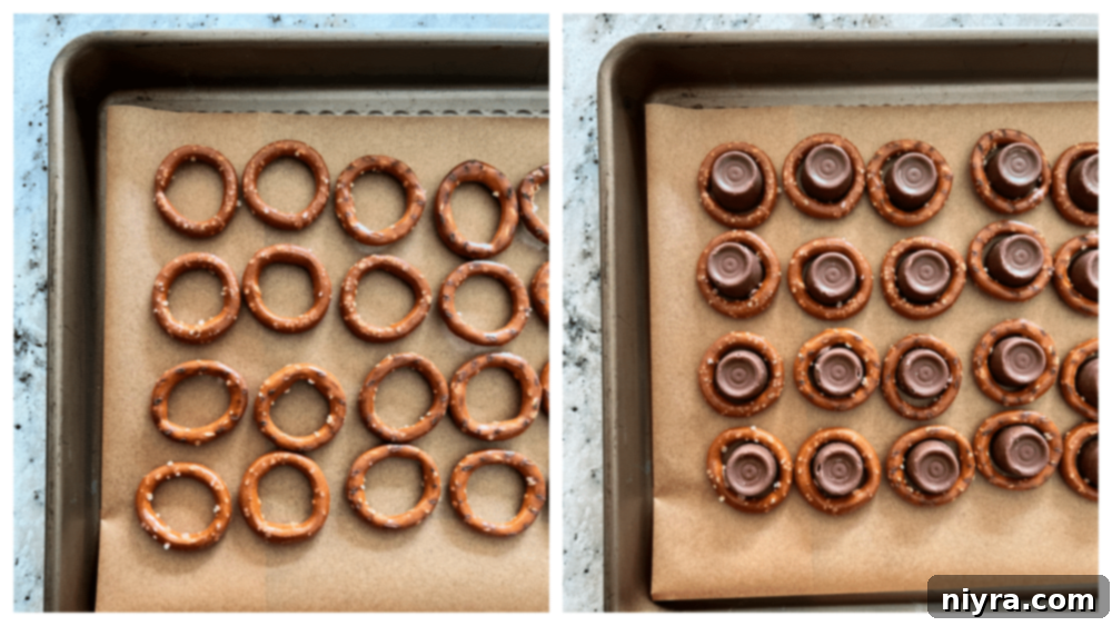 Circular pretzels arranged in neat rows on a baking sheet lined with parchment paper.