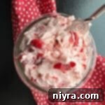 Crimson Cherry Whip 14 Cherry butter in a clear bowl.