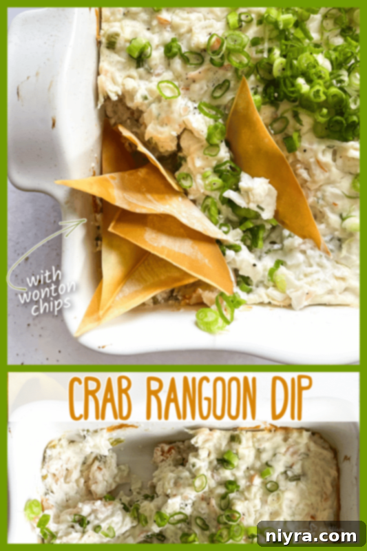 A beautifully presented Crab Rangoon Dip in a glass bowl, garnished with green onions, ready for a party.