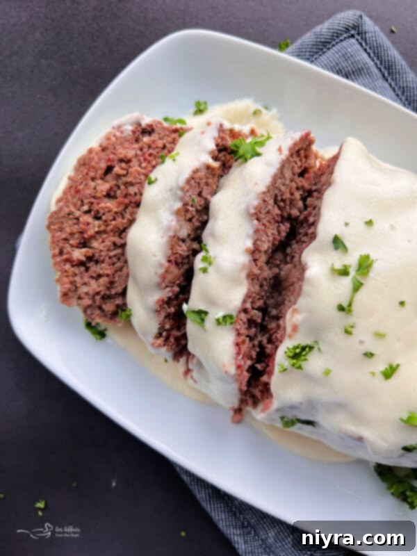 Reuben Meatloaf with Corned Beef and a Swiss Cheese Sauce