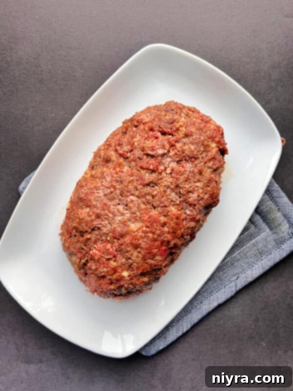 Swiss cheese sauce being prepared in a saucepan