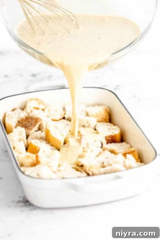 Crumb-Topped French Toast Casserole 8 Pouring custard mixture over bread cubes in a baking dish