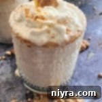 Extreme close up of banana cream pie shake.