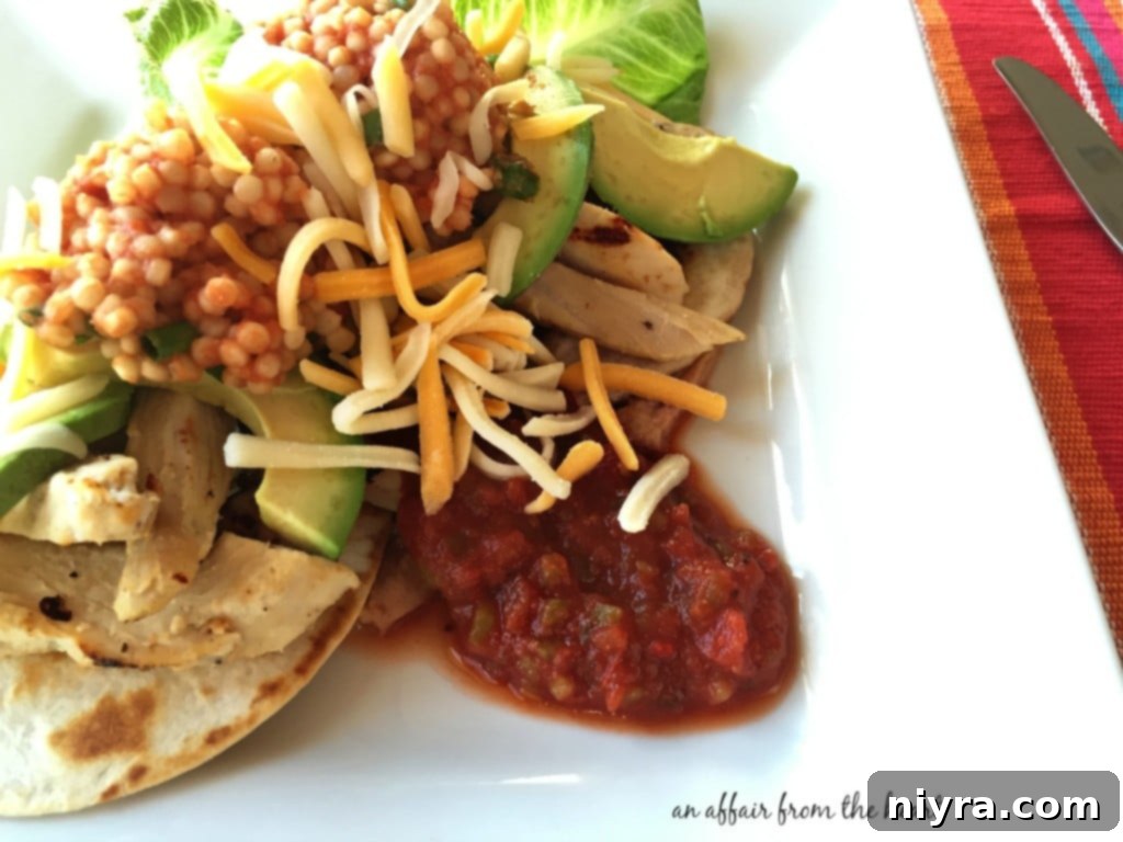 Fork & Knife Chicken Tacos with fresh toppings and Sargento Cheese