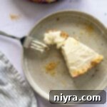 One Piece of Cheesecake on Plate