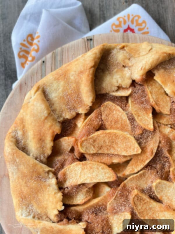 Rustic Apple Tart 13 Beautifully baked apple crostata on a rustic surface