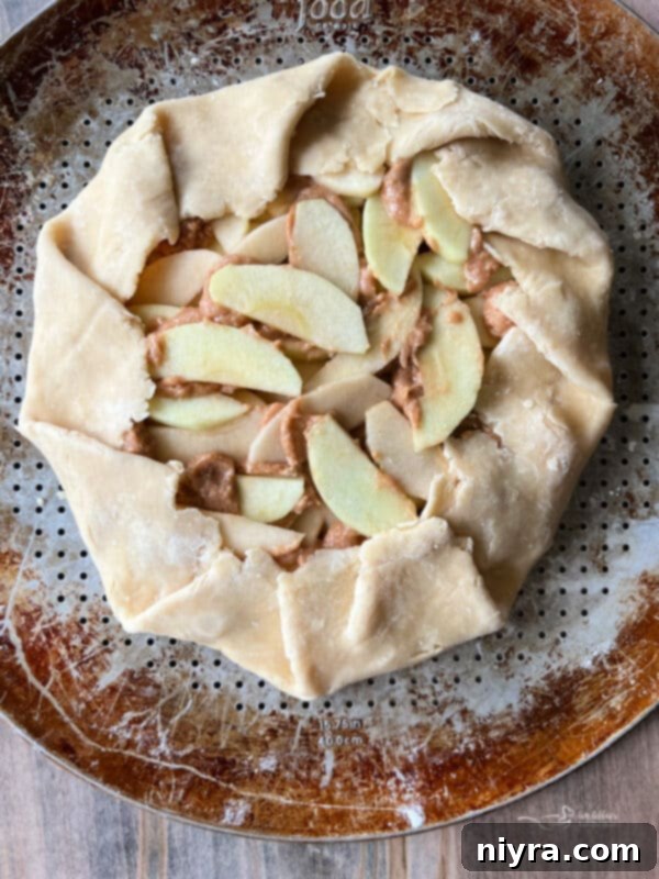 Rustic Apple Tart 10 Folding the crostata crust over spiced apples