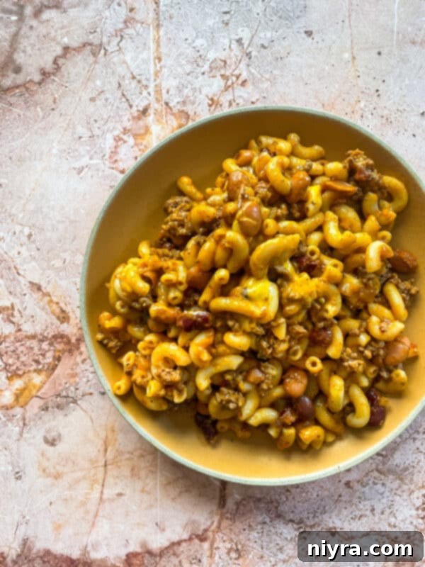 Chili Mac Skillet in a bowl with a spoon