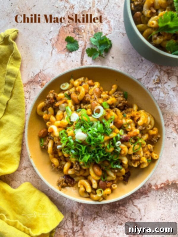 Chili Mac Skillet with a serving spoon