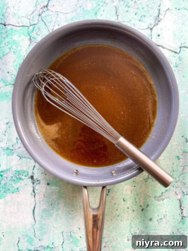 Homemade Pineapple Upside Down Cake 13 Melting butter for the pineapple topping