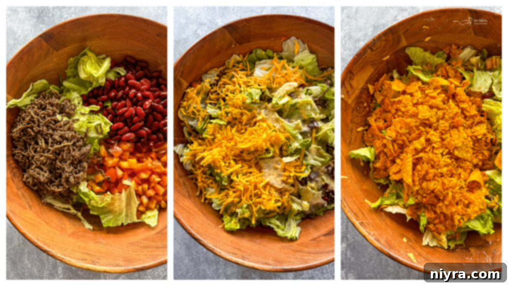 Aunt Sue's Ultimate Doritos Taco Salad 8 All the Doritos Taco Salad ingredients, including lettuce, ground beef, tomatoes, kidney beans, and cheese, in a large bowl, ready for tossing.