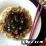 Homemade P.F. Chang's Mongolian Beef 2 Overhead of Copy Cat P.F. Changs Mongolian Beef on a white plate