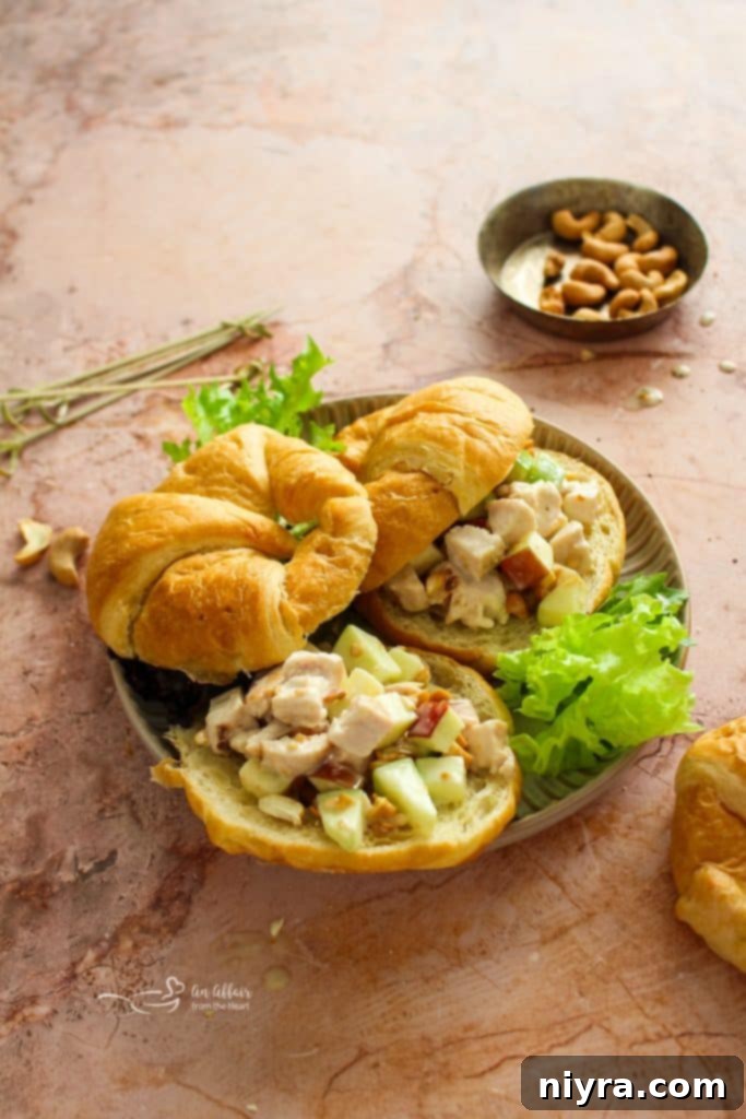 A close-up of Apple Chicken Salad with a focus on its fresh ingredients and textures, presented as a single serving.