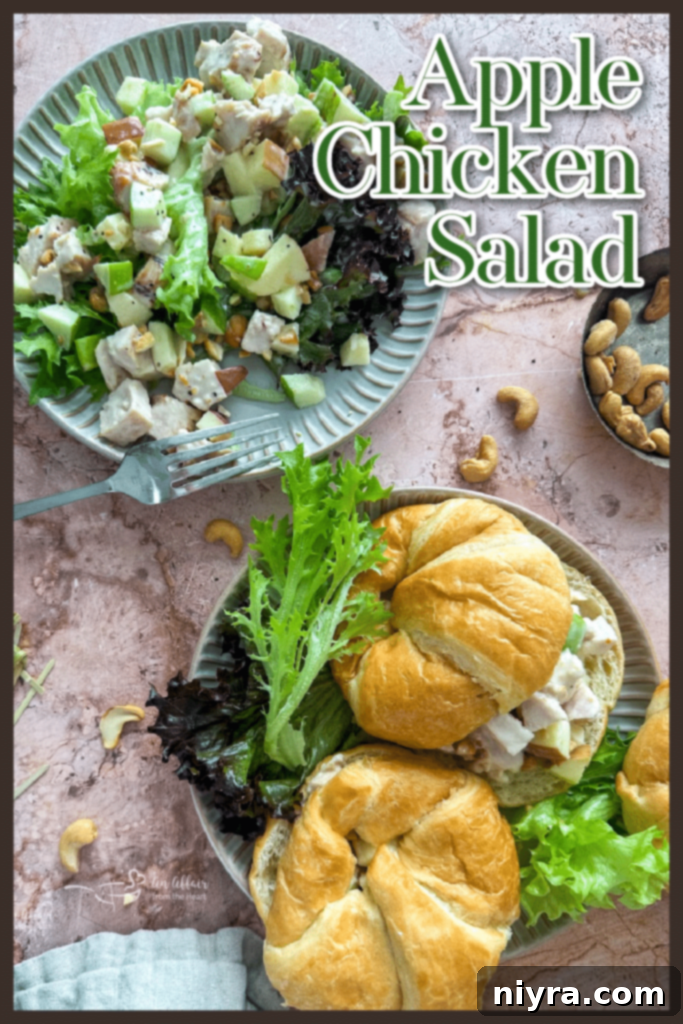 A serving of Apple Chicken Salad in a rustic bowl, garnished with fresh greens, ready to be enjoyed.