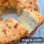 Two-Ingredient Pineapple Angel Food Cake, one slice cut