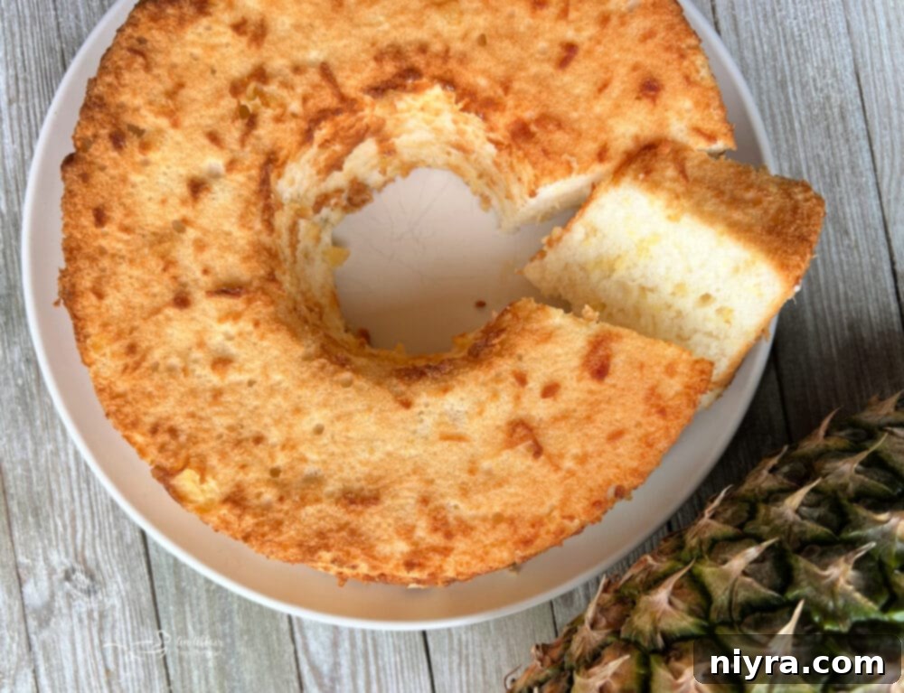 Another view of the baked Pineapple Angel Food Cake, showing its fluffy texture